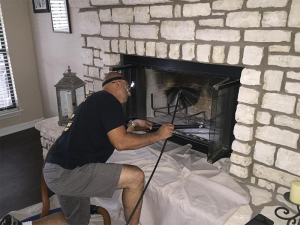 Professional chimney sweeping service done by Texas Air Duct Cleaning Services